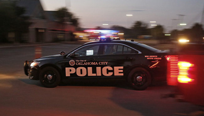 A police car drives into the Springlake Police Station in Oklahoma City, on Oct. 7, 2015. Former Oklahoma City police officer Daniel Holtzclaw, who worked in the department's Springlake Division, is accused of sexual offenses against 13 women he encountered while on patrol. In an investigation of sexual misconduct by U.S. law enforcement, The Associated Press uncovered about 1,000 officers who lost their badges in a six-year period for rape, sodomy and other sexual assault; sex crimes that included possession of child pornography; or sexual misconduct such as propositioning citizens or having consensual but prohibited on-duty intercourse. (AP Photo/Sue Ogrocki)