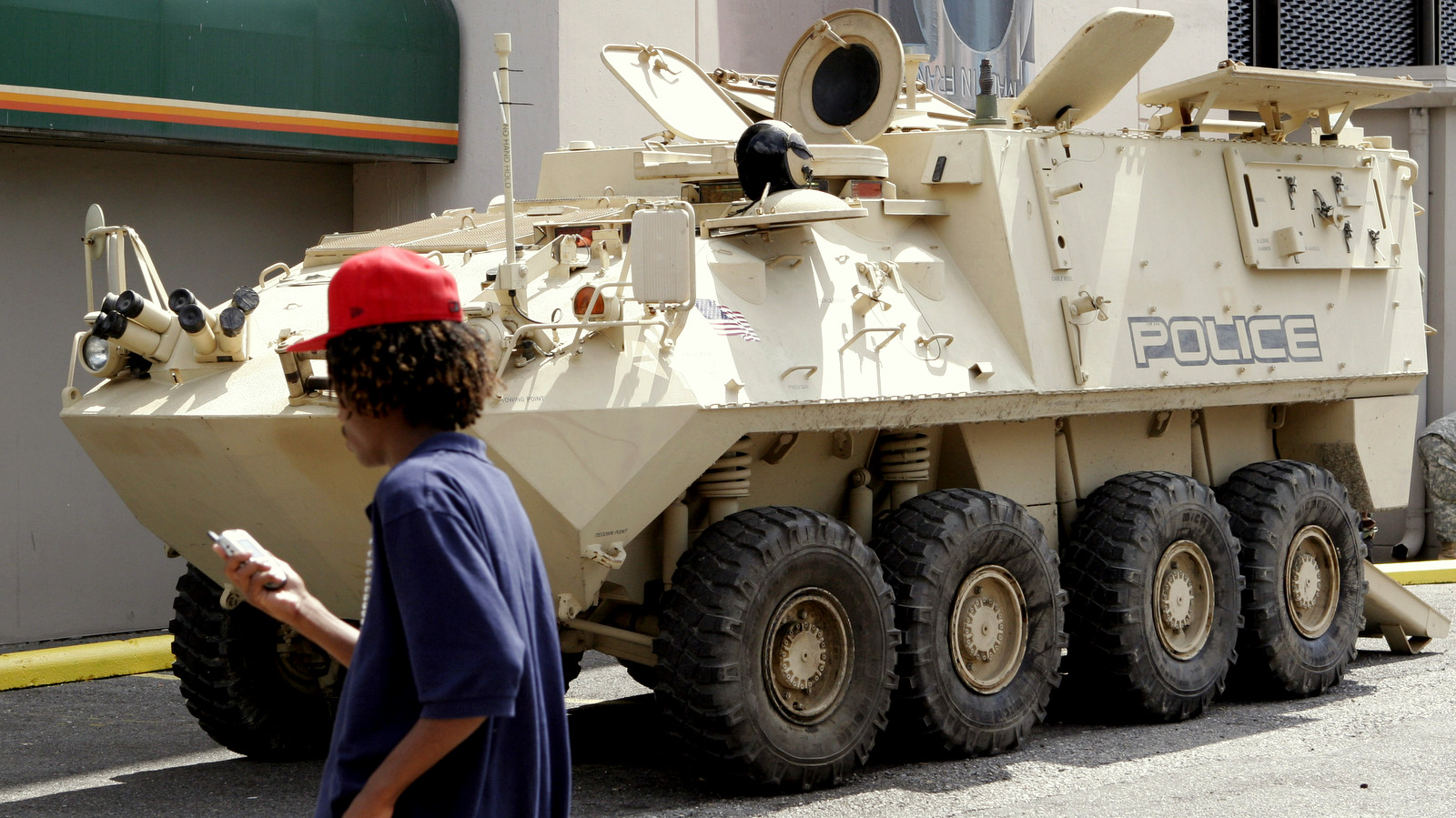 An armored vehicle used by state and local authorities for drug enforcement is brought into the city for school kids to tour in New Orleans/ (AP Photo/Alex Brandon)