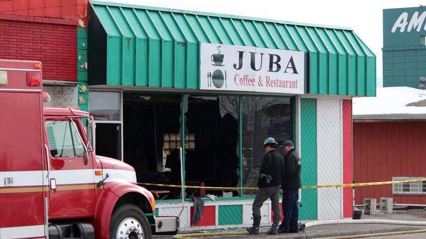 Investigators could be seen taking pictures of the site and digging through debris at Juba Coffee House, where a fire broke out in the early hours of Tuesday morning. Grand Forks Herald photo by Sarah Volpenhein.