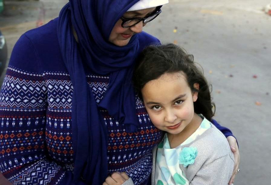 After hearing on the news that Donald Trump had called for a ban on all Muslim immigration into the United States, 8-year-old Sofia Yassini packed a bag with Barbie dolls, a tub of peanut butter and a toothbrush, her mother says. And she checked the locks of her family’s home because she thought soldiers were coming to take her away. (AP Photo)