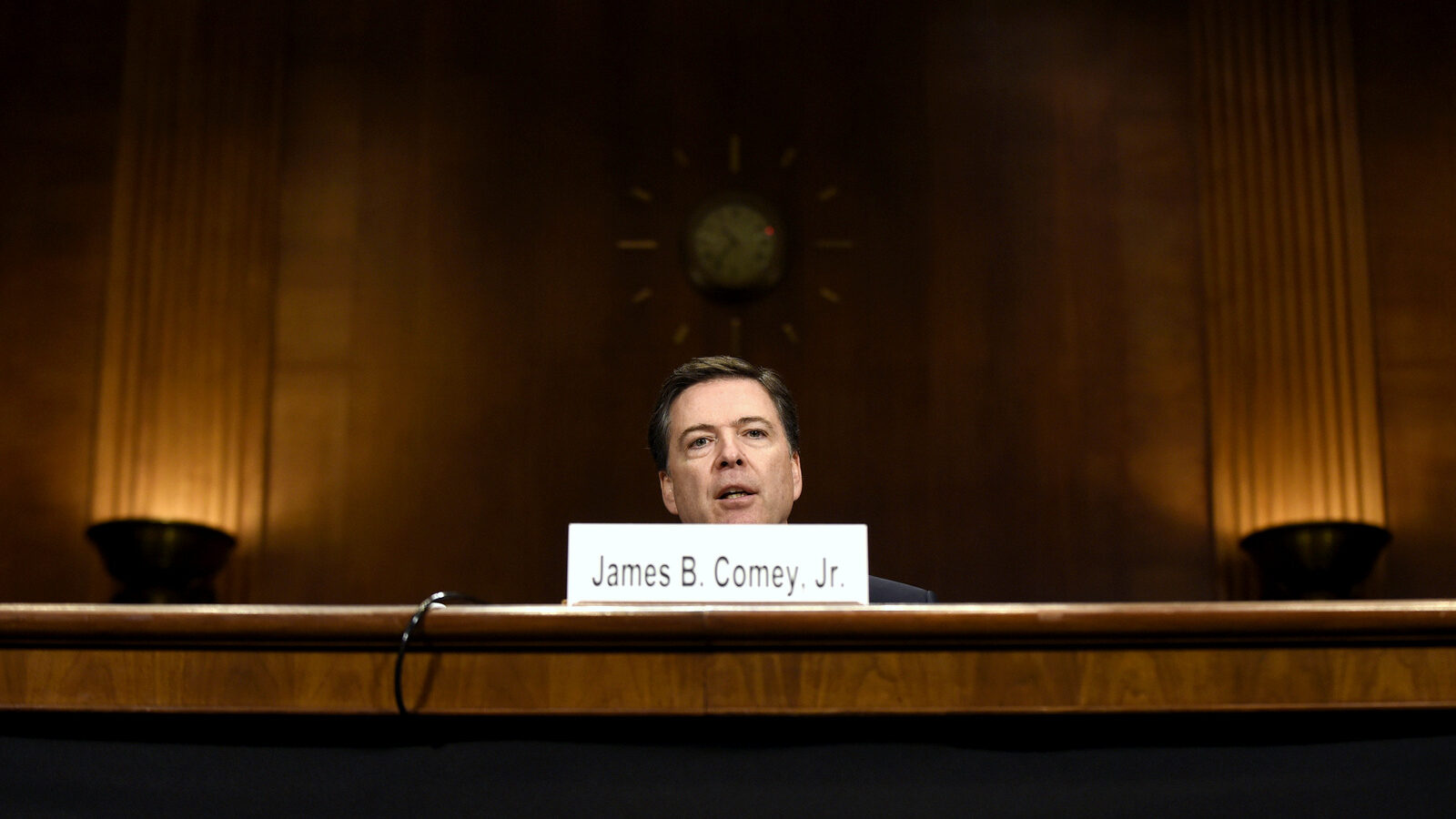 FBI Director James Comey testifies on Capitol Hill in Washington, Wednesday, Dec. 9, 2015, before the Senate Judiciary Committee. Comey said the two San Bernardino shooters were radicalized at least two years ago and had discussed jihad and martyrdom as early as 2013. (AP Photo/Susan Walsh)