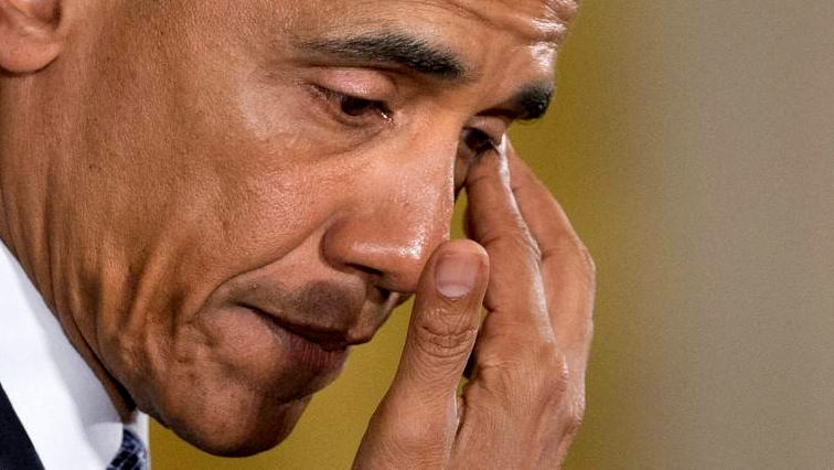 An emotional President Barack Obama pauses to wipe away tears as he recalled the 20 first-graders killed in 2012 at Sandy Hook Elementary School, while speaking in the East Room of the White House in Washington, Tuesday, Jan. 5, 2016, about steps his administration is taking to reduce gun violence. (AP Photo/Jacquelyn Martin)
