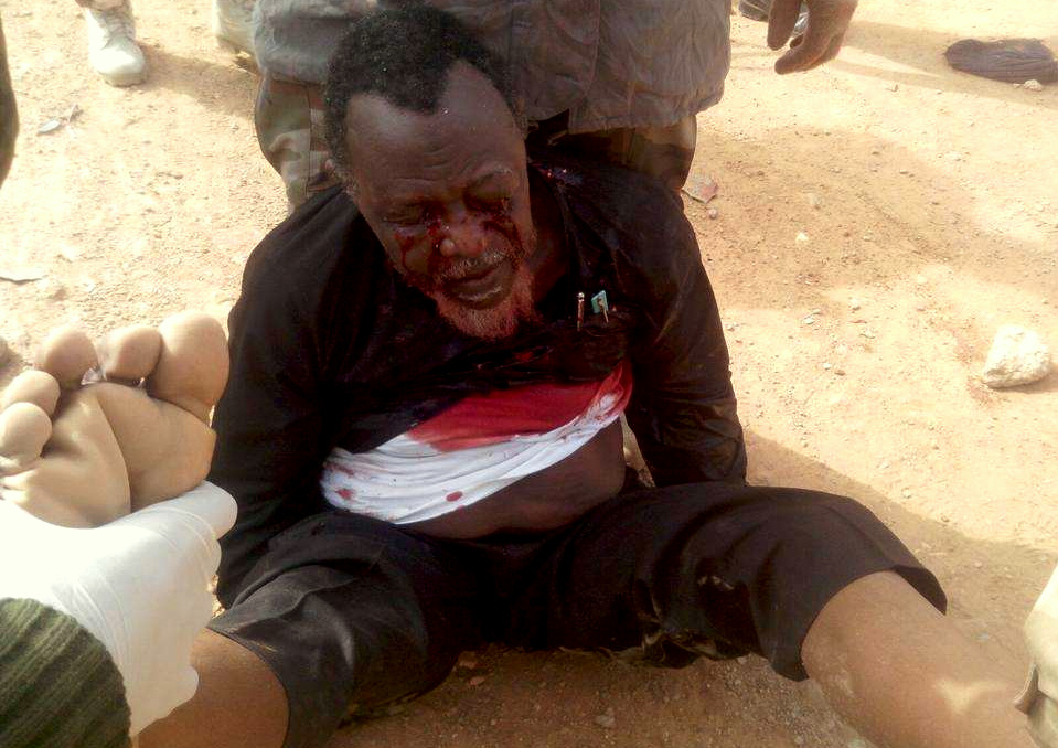 Ibrahim Zakzaky shown during his arrest by Nigerian security forces.