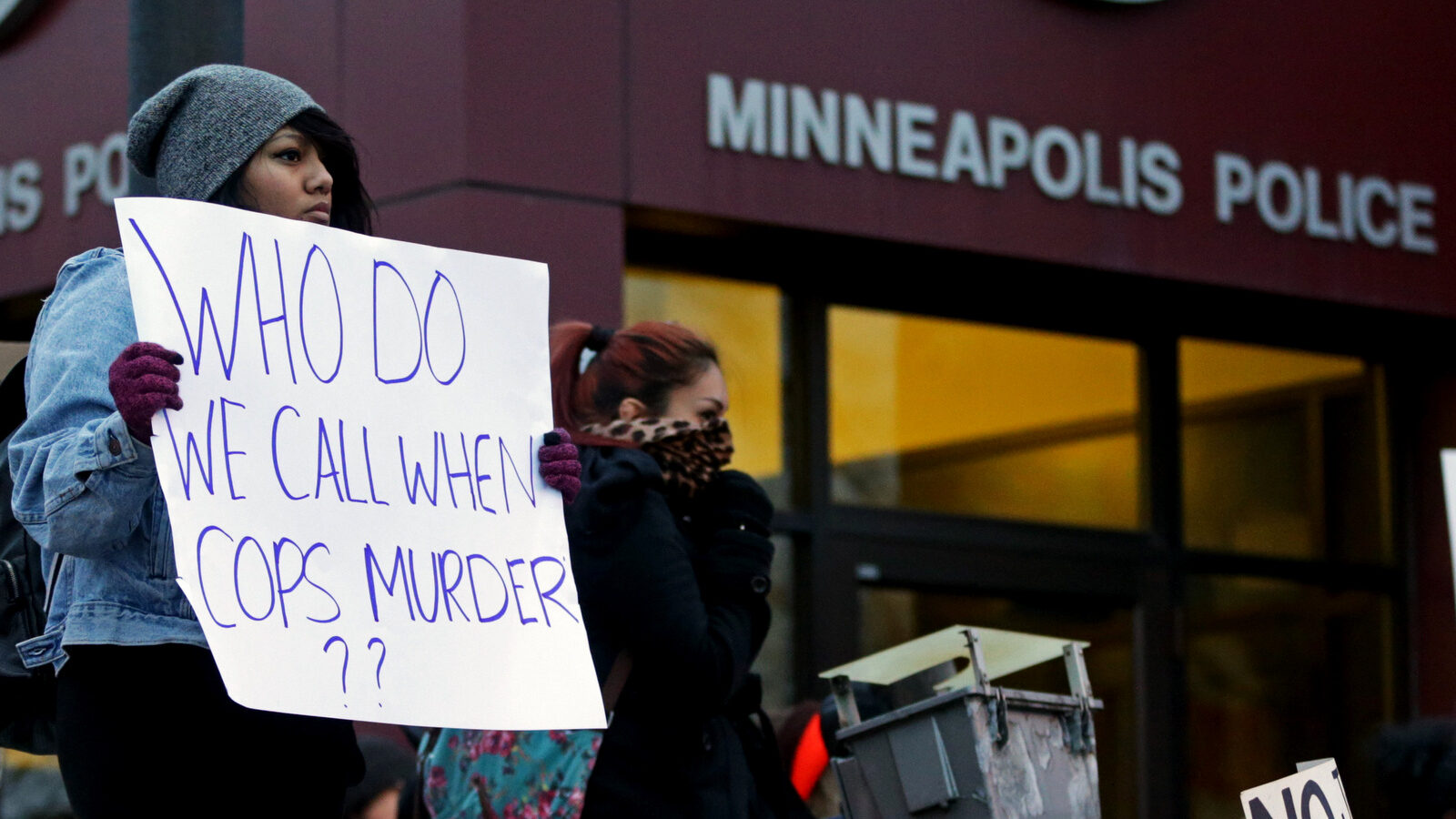 BLM protesters outsideof the Minneapolis Police Department's Third Precinct Nov. 25, 2014. (AP Photo/Jim Mone)