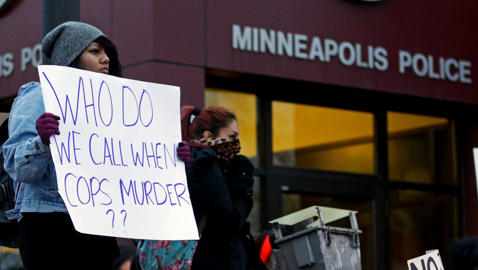 BLM protesters outsideof the Minneapolis Police Department's Third Precinct Nov. 25, 2014. (AP Photo/Jim Mone)