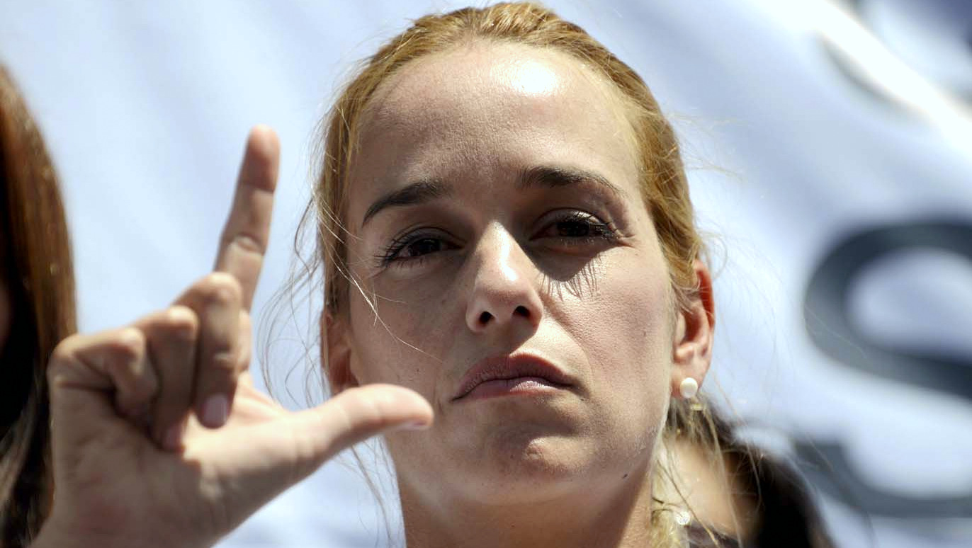 The wife of arrested opposition leader Leopoldo Lopez, Lilian Tintori, gestures during an opposition