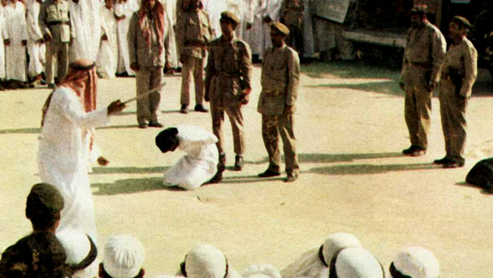 A public beheading taking place in a busy Saudi square.