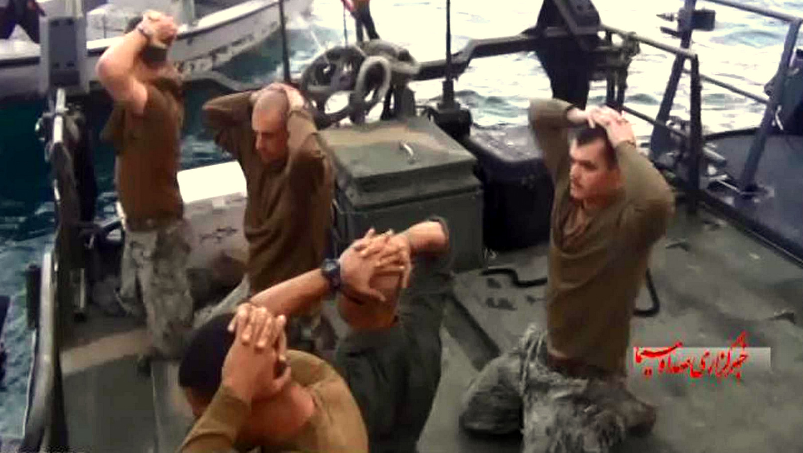 This frame grab from Jan. 12, 2016, video by the Iranian state-run IRIB News Agency shows the detention of U.S. Navy sailors by the Iranian Revolutionary Guard in the Persian Gulf. (IRIB)