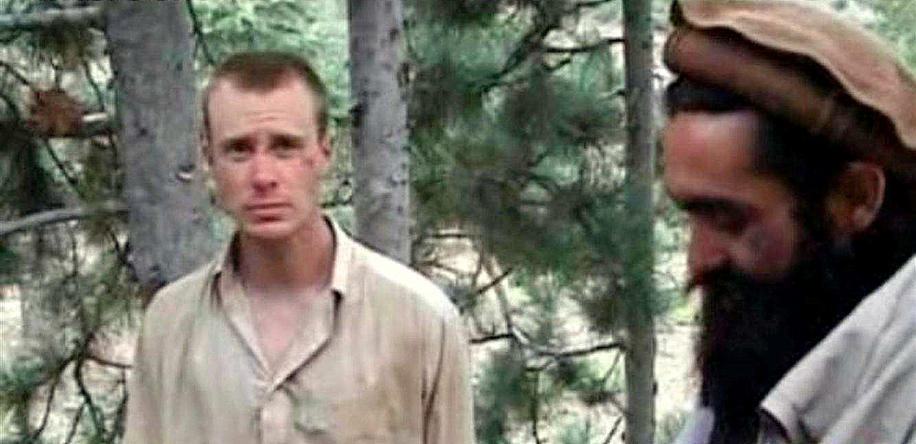 Then-captured U.S. Army soldier Bowe Bergdahl (L) with a Taliban commander (R) in a video released by the Taliban in 2010