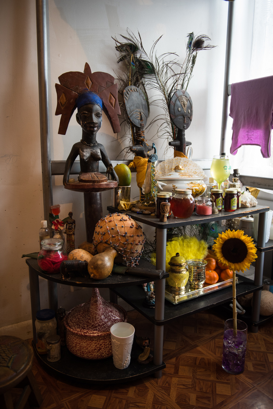 An alter of Santeria is on display at Janeelah's apartment on 758 Kelly Street in the Bronx, New York.