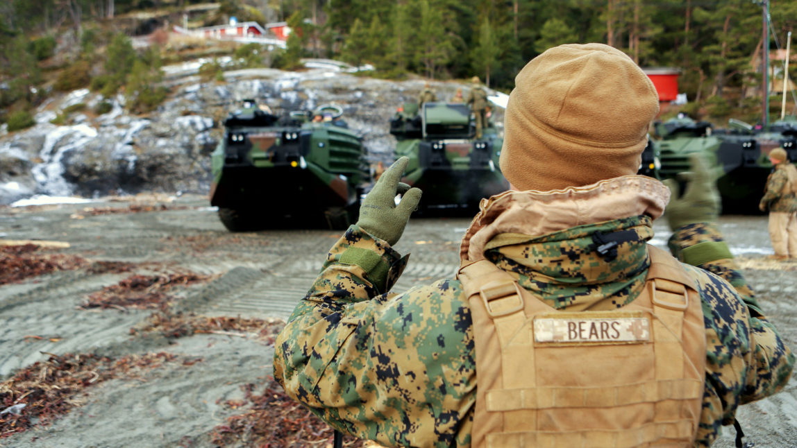 U.S. Marine Corps amphibious assault vehicles line up by the Trondheim Fjord, Norway, Jan. 9. These vehicles from the Marine Corps Prepositioning Program-Norway will support exercise Cold Response 16, scheduled for later this month, with crisis response equipment including M1A1 battle tanks, amphibious assault vehicles, artillery, and logistics equipment drawn from Norwegian caves. (Photo: U.S. Marine Corps)
