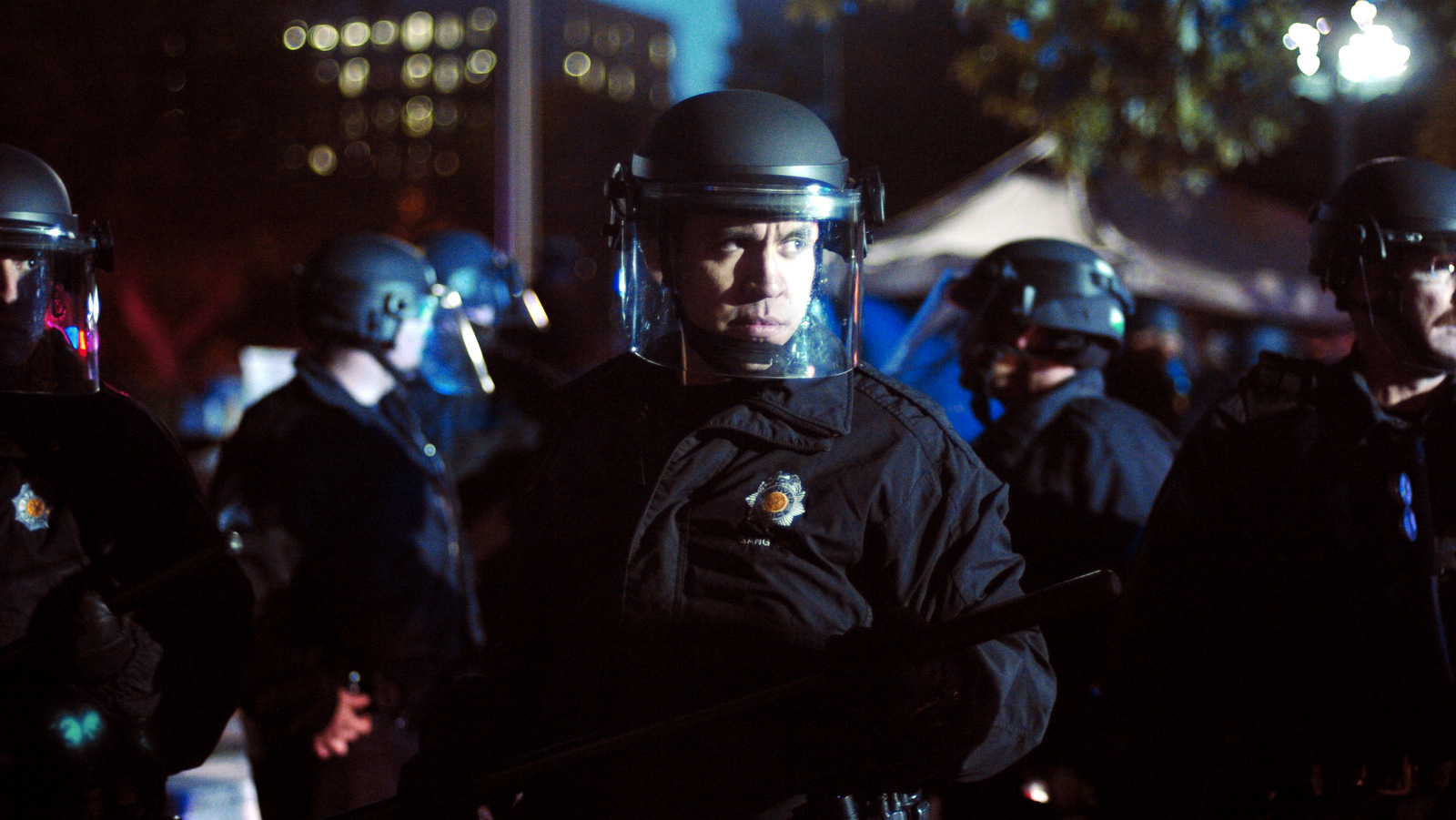 Riot police amass at the Occupy Denver protest in front of the state Capitol building Friday, Oct. 14, 2011. (AP Photo/Thomas Peipert)