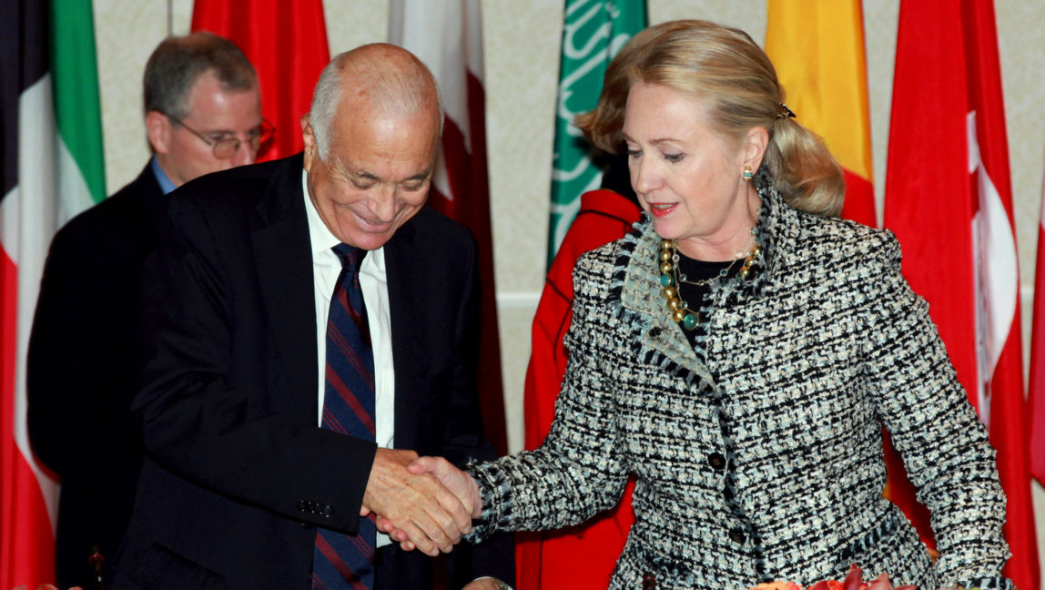 Secretary of State Hillary Rodham Clinton, right, welcomes Nabil Elaraby, left, Head of the Arab League as she hosts a gathering of Friends of Syria group on Friday, Sept. 28, 2012 in New York. (AP Photo/David Karp))