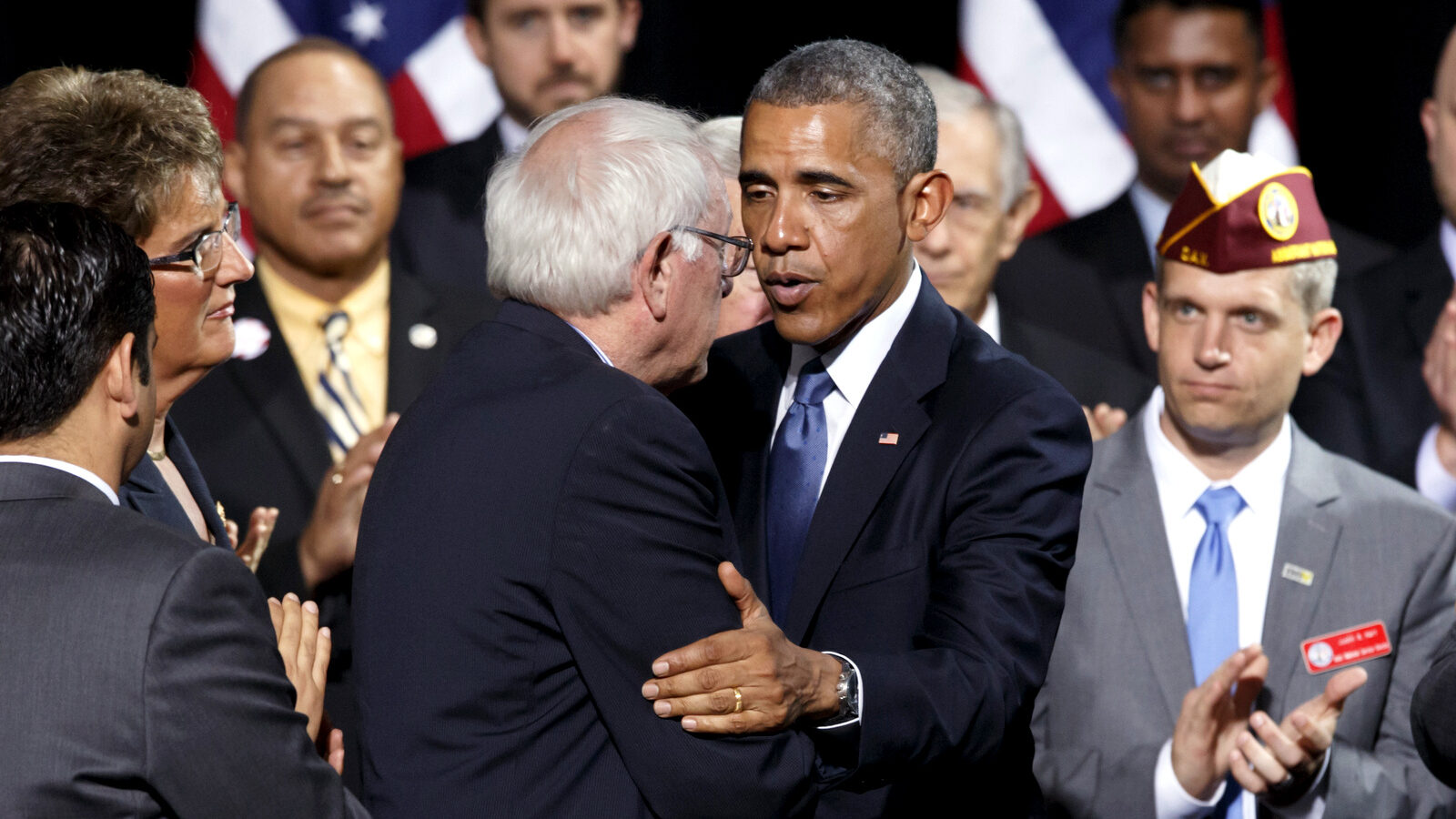President Barack Obama embraces Senate Veterans’ Affairs Chairman Sen. Bernie Sanders, I-Vt., as he visits Fort Belvoir, Va., an Army base 20 miles south of Washington. (AP Photo/J. Scott Applewhite)