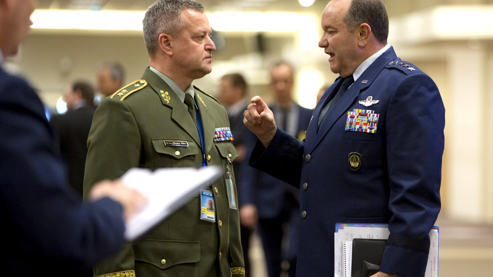 Supreme Allied Commander Europe, Gen. Philip Breedlove, right, speaks with Czech Republic's NATO-EU military representative Maj. Gen. Miroslav Zizka, center, prior to a meeting at NATO headquarters in Brussels on Wednesday, Feb. 10, 2016. NATO defense ministers convene a two-day meeting to discuss current defense issues and whether the Alliance should take a more direct role in dealing with its gravest migrant crisis since WWII. (AP Photo/Virginia Mayo, Pool)