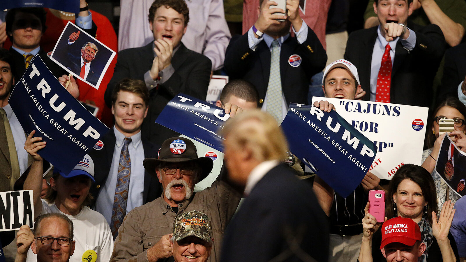 The crowd cheers as Republican presidential candidate Donald Trump speaks at a campaign rally in Baton Rouge, La., Thursday, Feb. 11, 2016. (AP Photo/Gerald Herbert)