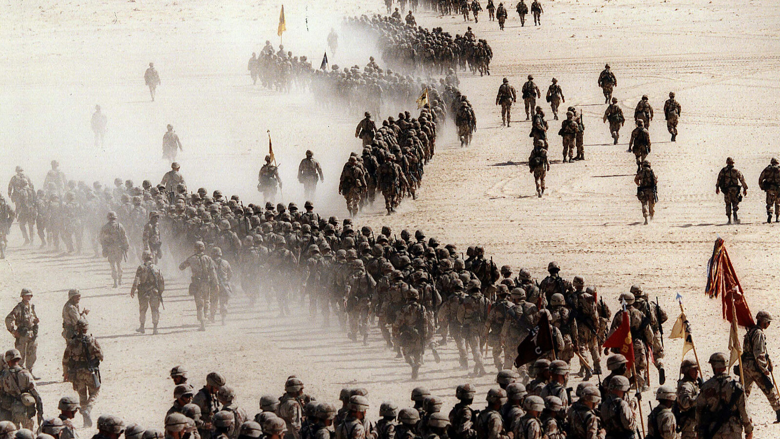 The U.S. 1st Cavalry Division deploy across the Saudi desert on during preparations prior to the Gulf War, 1990. (AP Photo/Greg English)