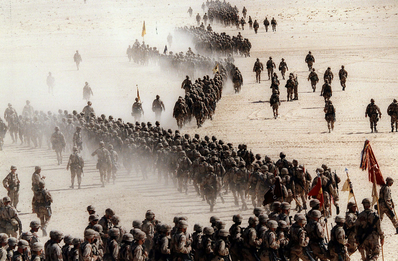 The U.S. 1st Cavalry Division deploy across the Saudi desert on during preparations prior to the Gulf War, 1990. (AP Photo/Greg English)