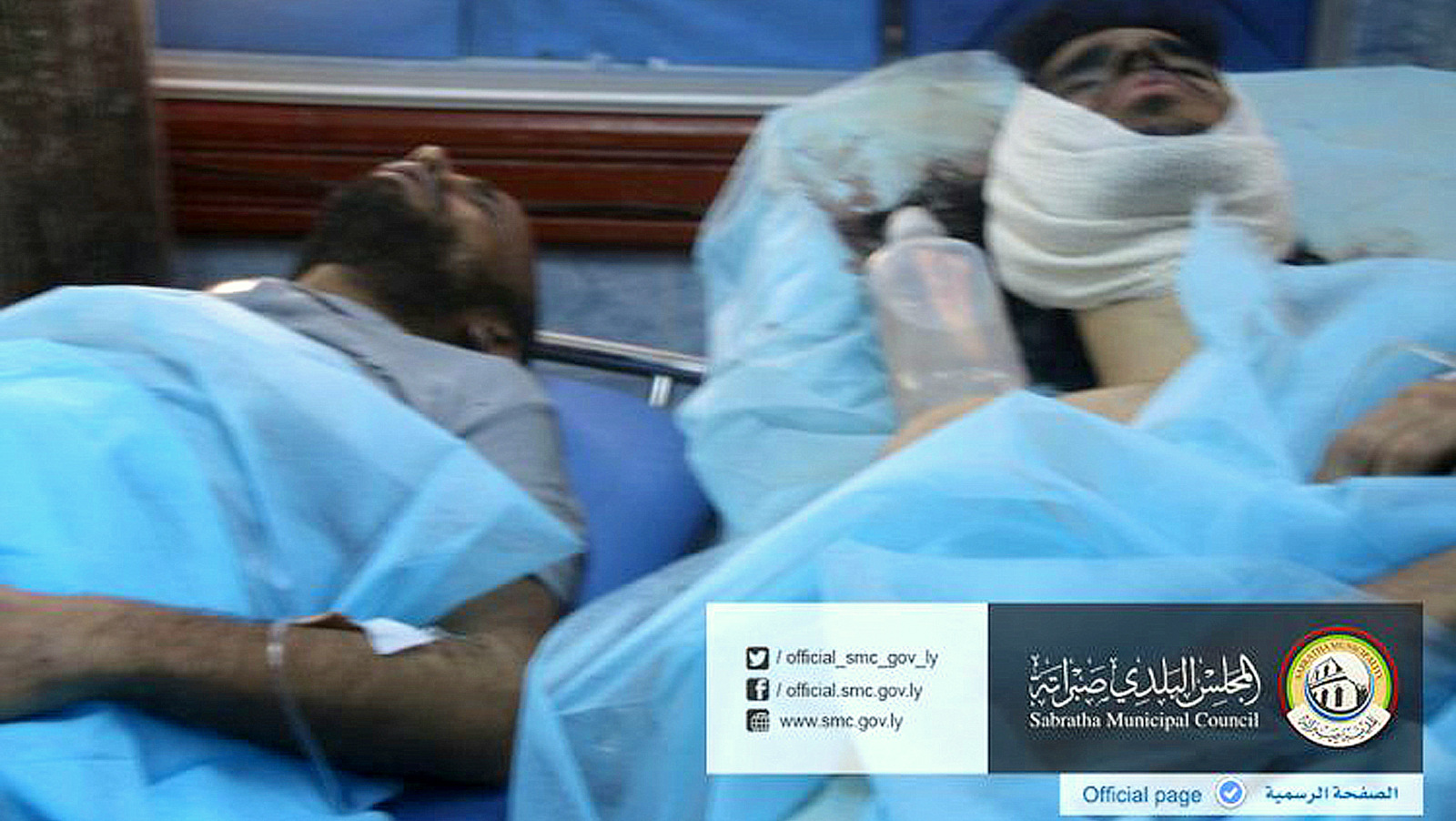 In this picture released online by the Sabratha Municipal Council on Friday, Feb. 19, 2016 wounded men lie in a hospital after U.S. airstrikes that were supposed to be aimed at an ISIS training camp in Sabratha, Libya near the Tunisian border