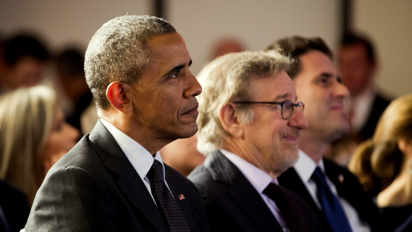 President Barack Obama, left, sits with filmmaker Steven Spielberg, center, and Israeli Ambassador to the US Ron Dermer, right, at the Righteous Among the Nations Award Ceremony at the Israeli Embassy in Washington, Wednesday, Jan. 27, 2016.(AP Photo/Pablo Martinez Monsivais)