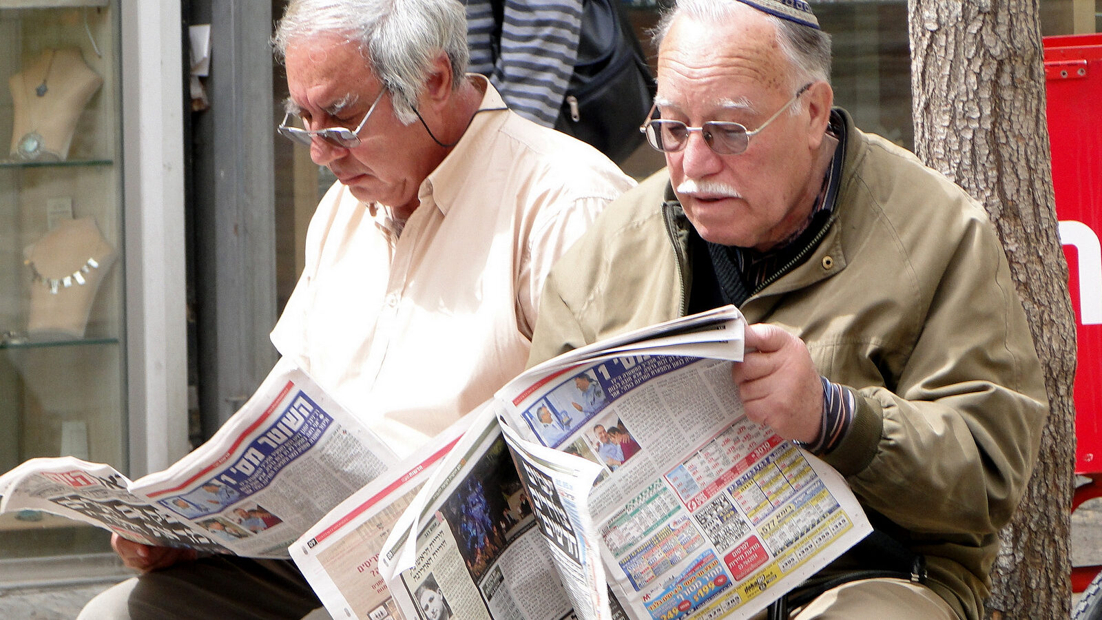 Israeli's read the morning paper on Ben Yehuda Street. Israel’s new military censor, Col. Ariella Ben Avraham, has mandated expanded monitoring and censorship of Israeli media, requiring social media activists and bloggers to have 'security related content' vetted by the government.