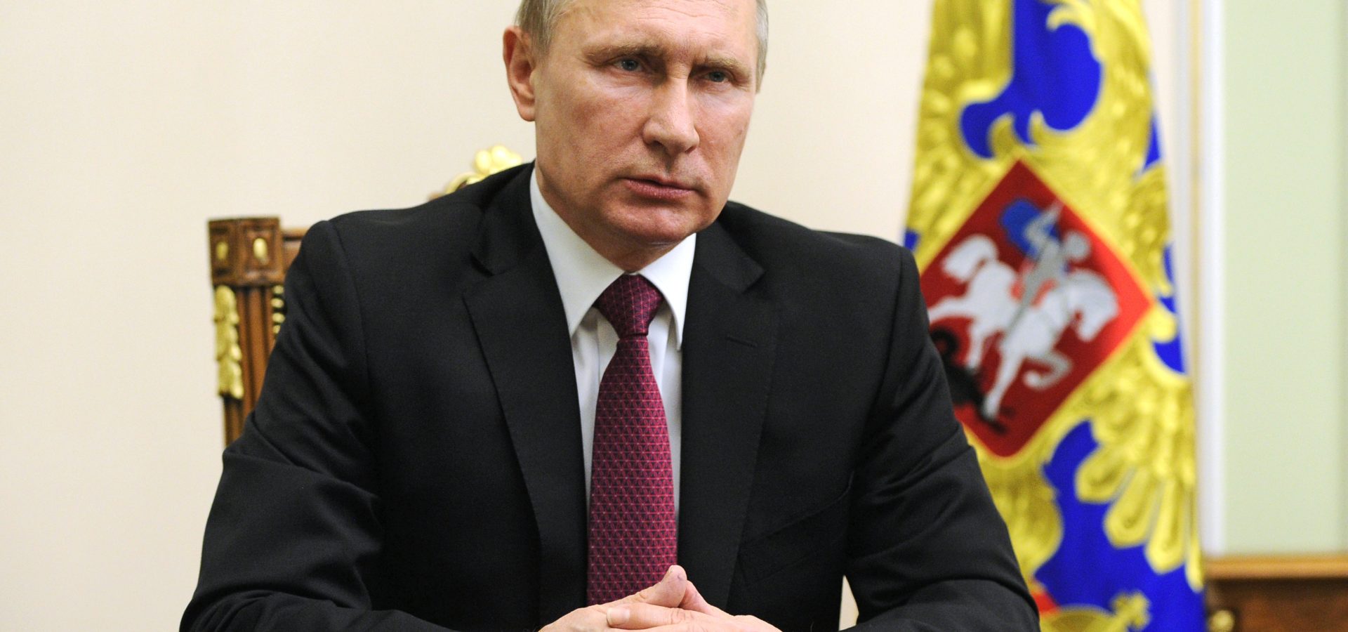 Russian President Vladimir Putin is seen during his speech with a special message after his telephone conversation with U.S. President Barack Obama at the Novo-Ogaryovo residence outside Moscow, Russia, Monday, Feb. 22, 2016. The U.N. special envoy for Syria, Staffan de Mistura, says the cease-fire reached by the United States and Russia and set to begin at midnight Saturday in Syria gives the two world powers the task of making sure that everyone else abides by it, too. (Mikhail Klimentyev/ Sputnik, Kremlin Pool Photo via AP)
