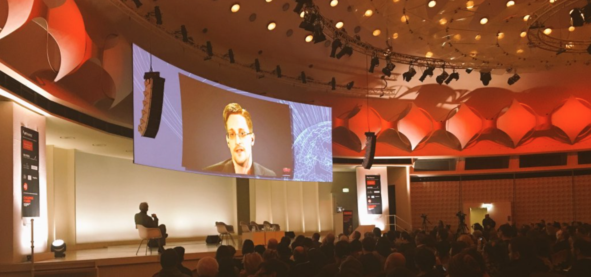 Edward Snowden addressing an audience live in Berlin via video link on Saturday evening.