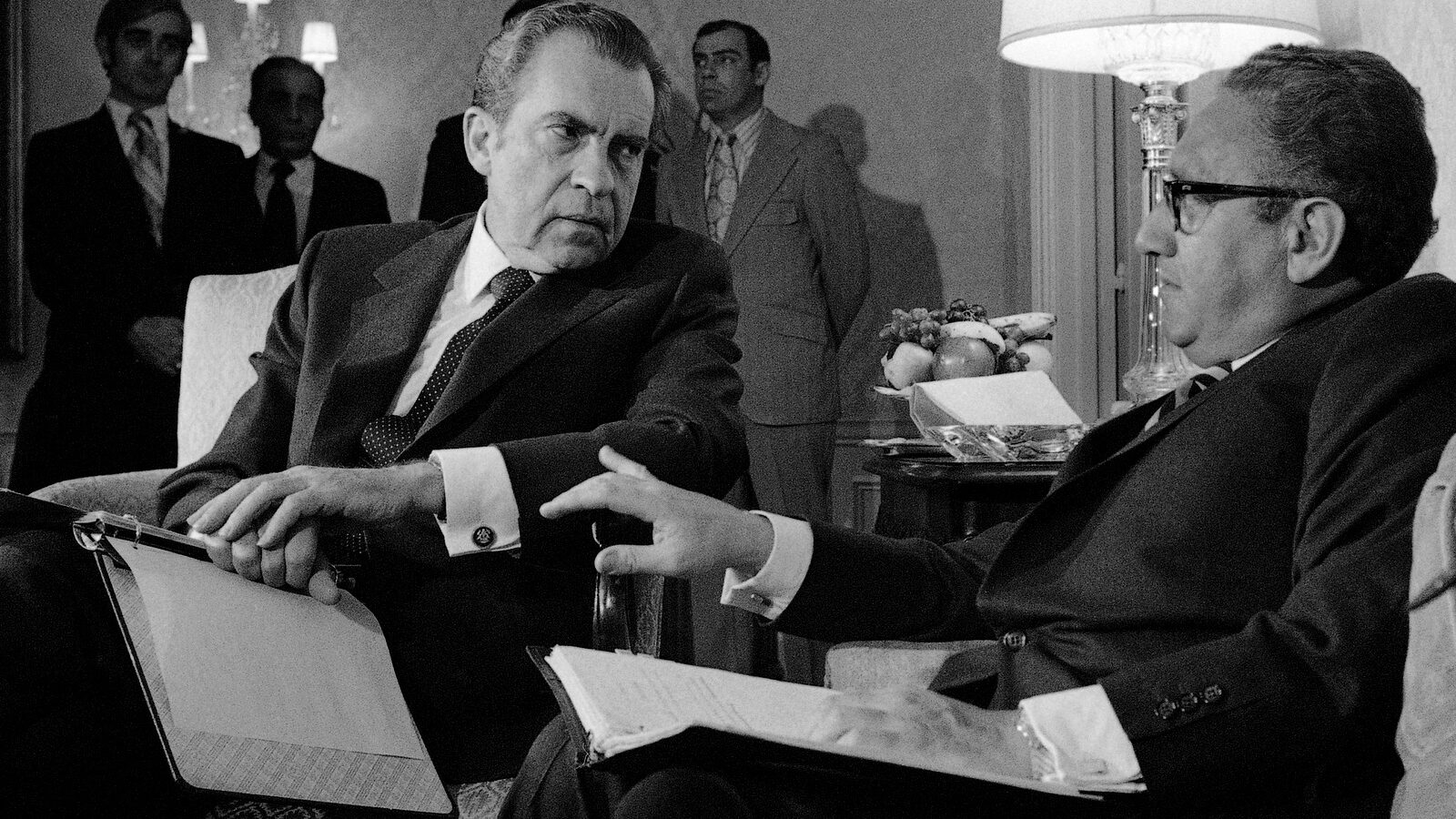 President Nixon confers with then National Security adviser, and current war criminal Henry Kissinger, Nov. 25, 1972. (AP Photo)