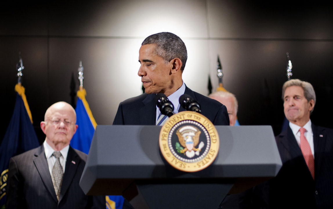 President Barack Obama, accompanied by, from left, Office of National Intelligence Director James Clapper, Vice President Joe Biden, and Secretary of State John Kerry, walks away from the podium after speaking at the National Counterterrorism Center in McLean, Va.,Thursday, Dec. 17, 2015. (AP Photo/Pablo Martinez Monsivais)