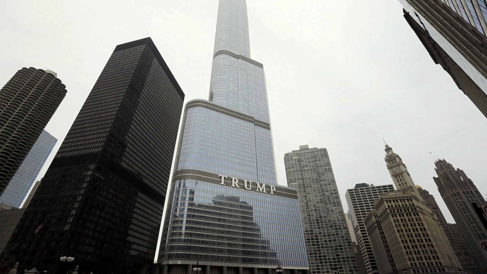 In this Thursday, March 10, 2016, photo is the Trump International Hotel and Tower in Chicago. Republican presidential candidate Donald Trump has pledged to scrap a work visa program that brings 300,000 student workers each year to the U.S. Among the businesses that would be forced to stop hiring foreign labor: Trump's own. (AP Photo/Charles Rex Arbogast)