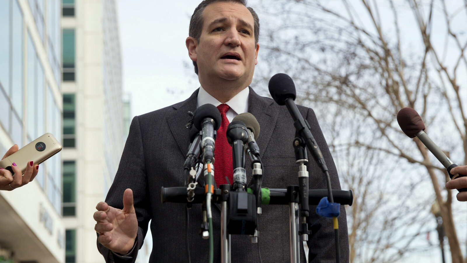 Republican presidential candidate, Sen. Ted Cruz, R-Texas speaks to the media about events in Brussels, Tuesday, March 22, 2016, near the Capitol in Washington. Cruz said he would use the "full force and fury" of the U.S. military to defeat the Islamic State group. (AP/Jacquelyn Martin)