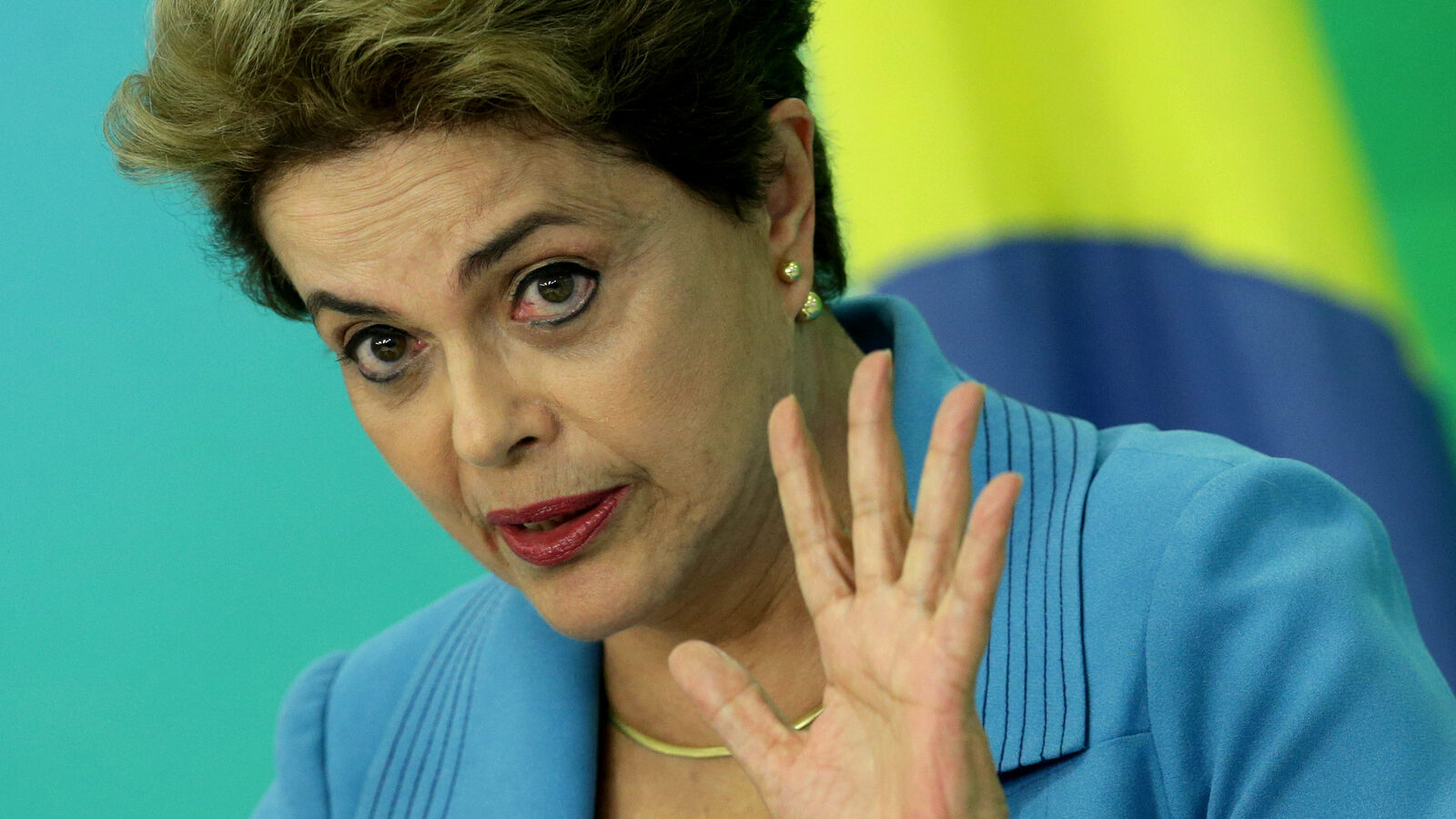 Brazil's President Dilma Rousseff speaks during a press conference about her impeachment process, at Planalto Presidential Palace, in Brasilia, Monday, April 18, 2016. President Rousseff appeared on the verge of losing office after a congressional vote to impeach her and signs suggested only tenuous support for her in the Senate, which will decide whether to remove her amid a political and economic crisis. (AP Photo/Eraldo Peres)
