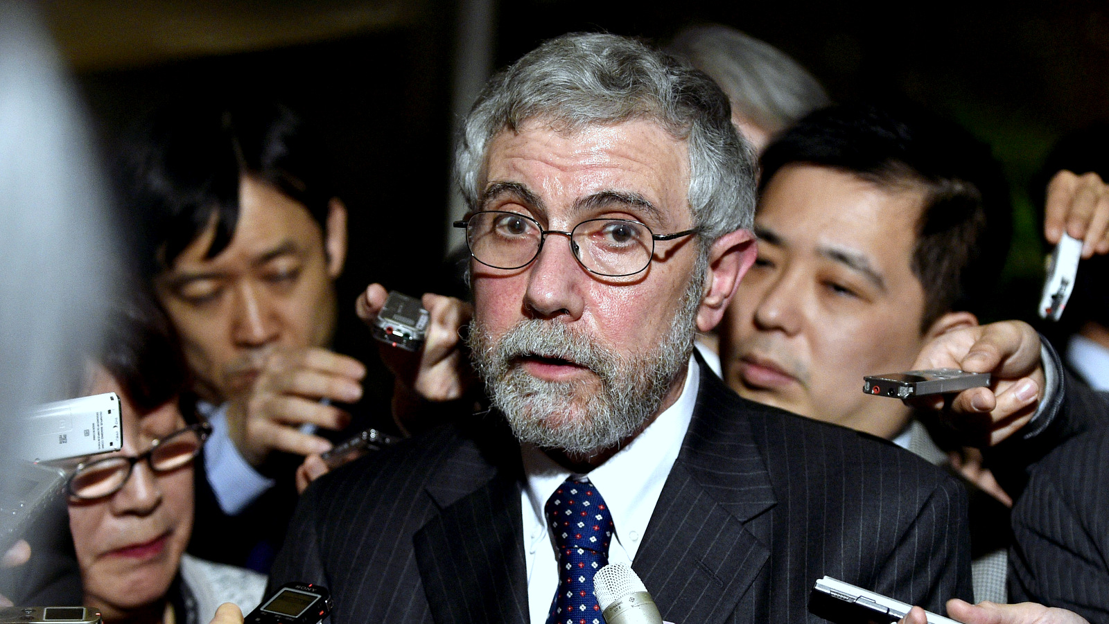US economist Paul Krugman, shown here after his meeting with Japanese Prime Minister Shinzo Abe, recently unleashed a no holds barred  tirade against Bernie Sanders. (Franck Robichon/Pool Photo via AP)
