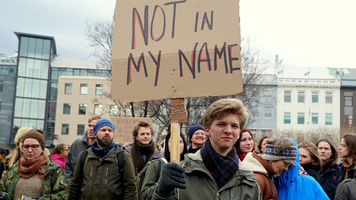 People protest in front of Parliament building in Reykjavik, Iceland, Tuesday April 5, 2016. The leak of millions of records on offshore accounts claims its first high-profile victim as Iceland's prime minister resigns amid outrage over revelations he used such a shell company to conceal a conflict of interest. (AP Photo/David Keyton)