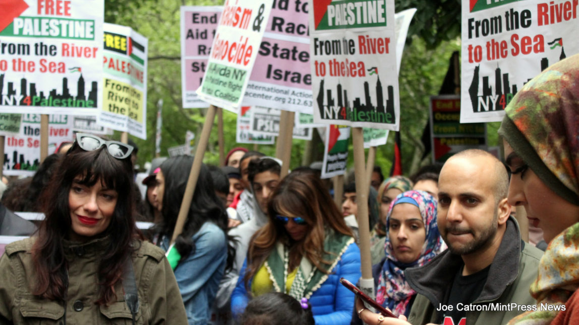 Hundreds Rally beside City Hall in Manhattan before marching over the Brooklyn Bridge to gather in Cadman Plaza Park in support of the Palestinian right of return.