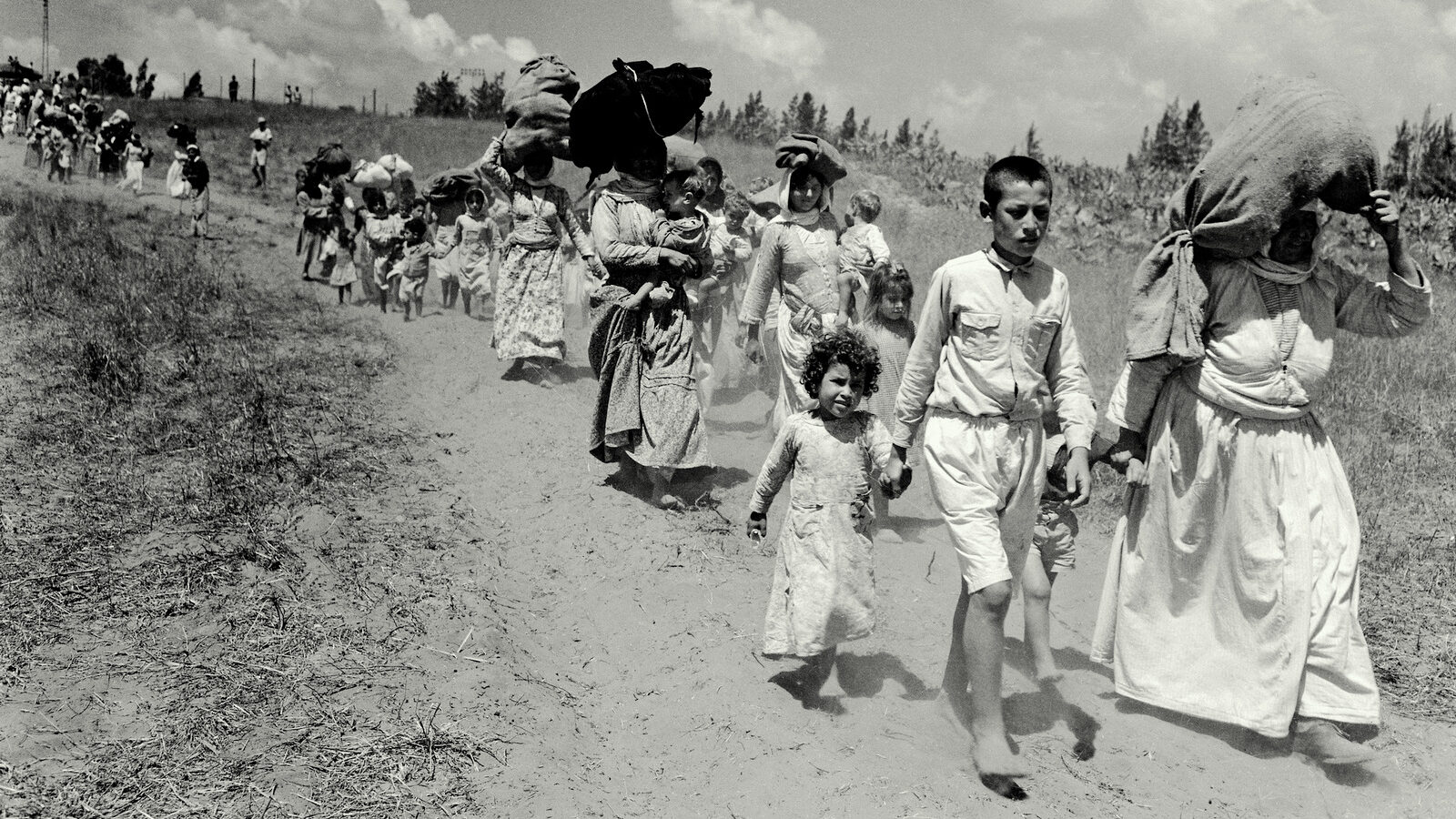 Palestinian refugees flee a village near Haifa, in June, 1948, during the 1948 war.