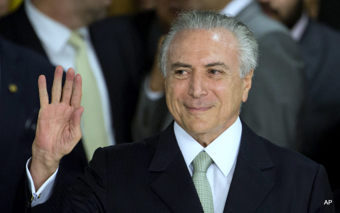Brazil's acting President Michel Temer arrives to speak, at Planalto presidential palace in Brasilia, Brazil, Thursday, May 12, 2016.