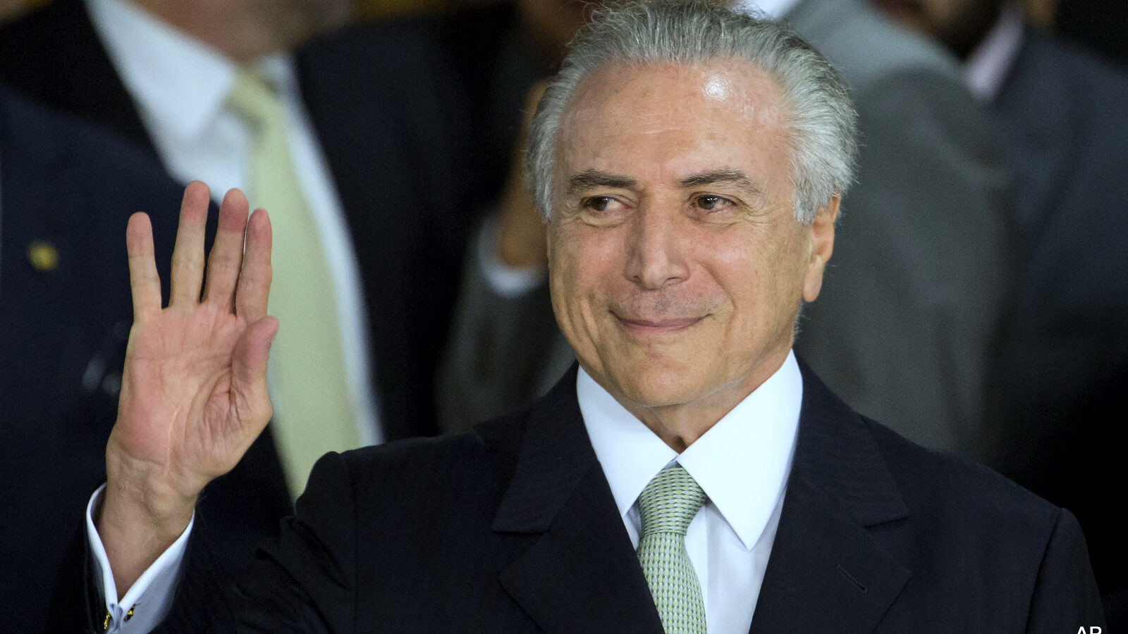 Brazil's acting President Michel Temer arrives to speak, at Planalto presidential palace in Brasilia, Brazil, Thursday, May 12, 2016.