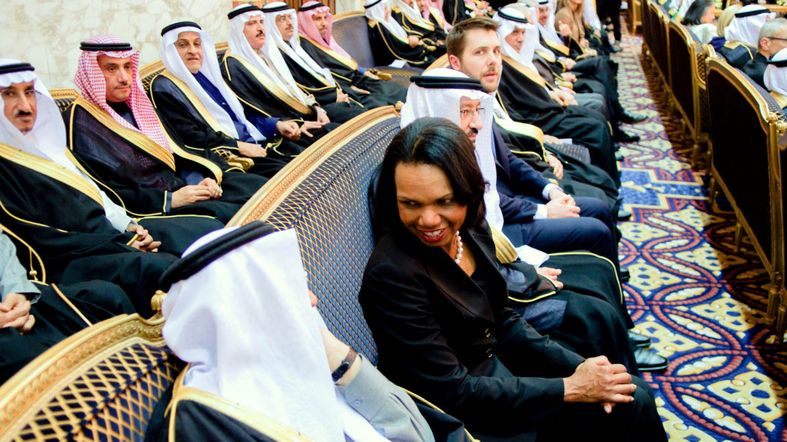 Former Secretary Of State Condoleeza Rice chats with a member of the Saudi Royal Family after welcoming the new King Salman of Saudi Arabia, 27 January 2015