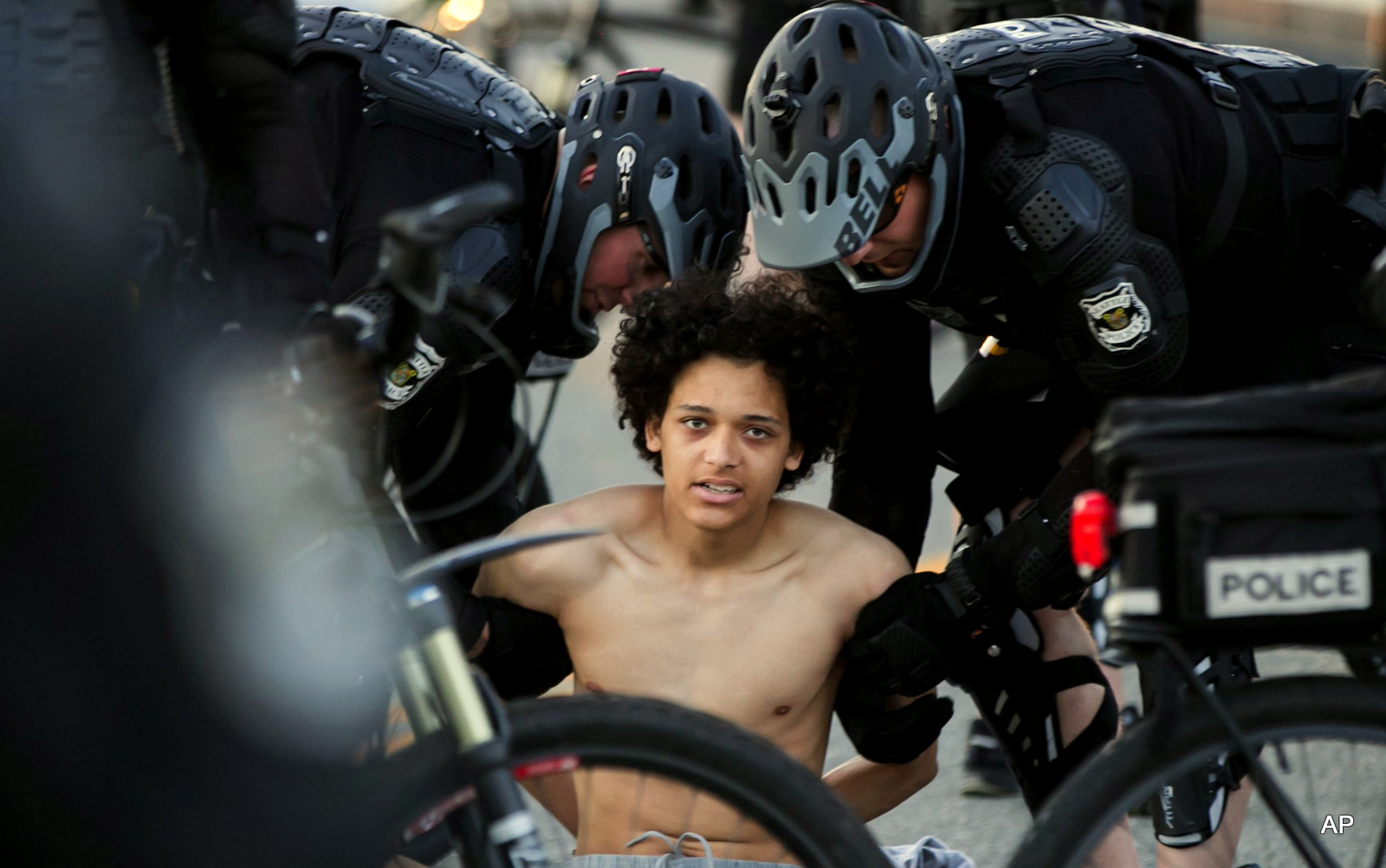 Seattle Police arrest a protester on 4th Avenue South in Sodo during the annual May Day protest and march Sunday, May 1, 2016, in Seattle, Wash. 