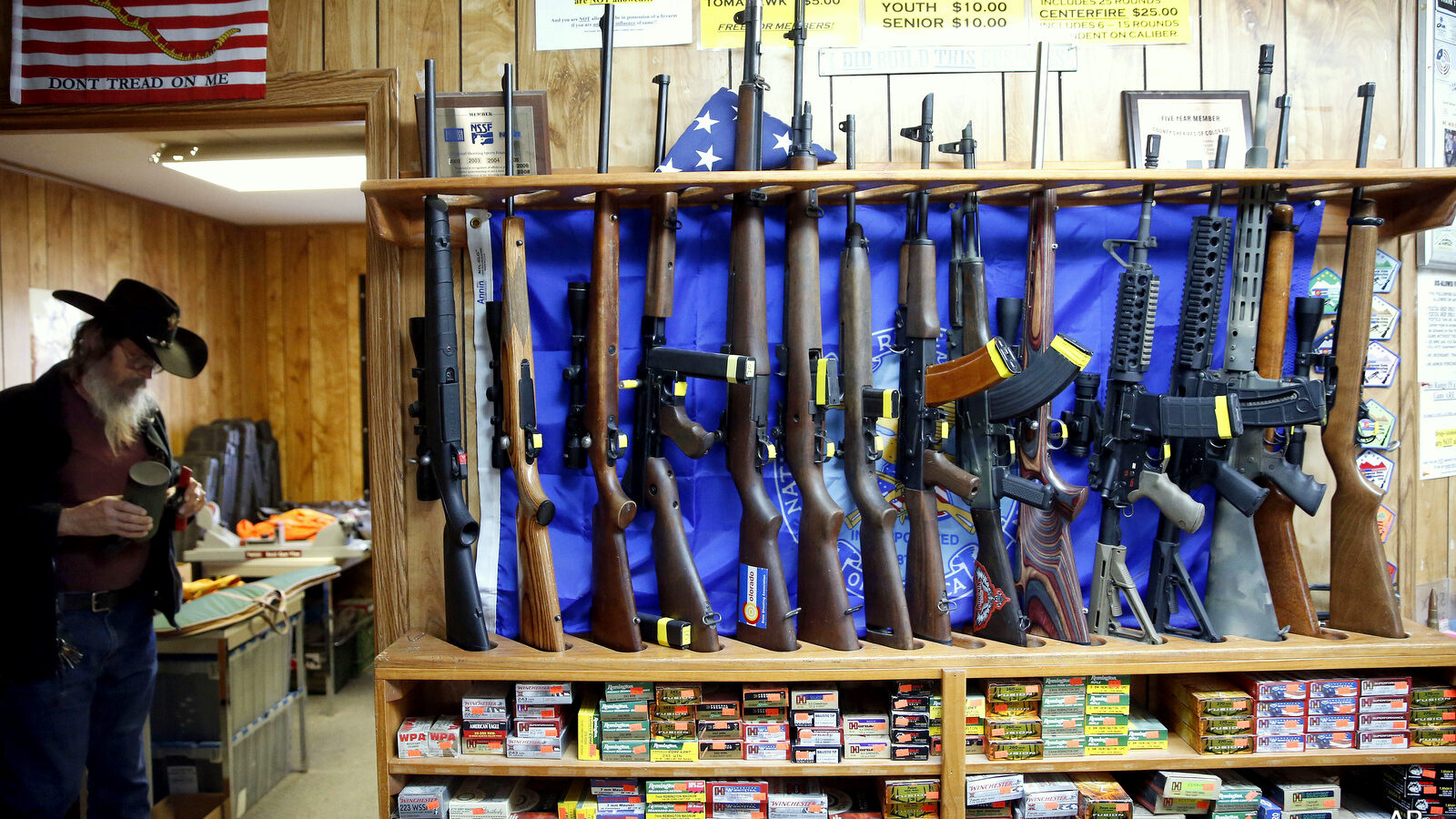 In this March 15, 2016 photo, guns for rent are on display at a shooting range and retail store in Cherry Creek, Colo. . Across the U.S., suicides account for nearly two-thirds of all gun deaths, with 21,334 gun deaths by suicide in 2014, according to federal data. (AP Photo/Brennan Linsley)