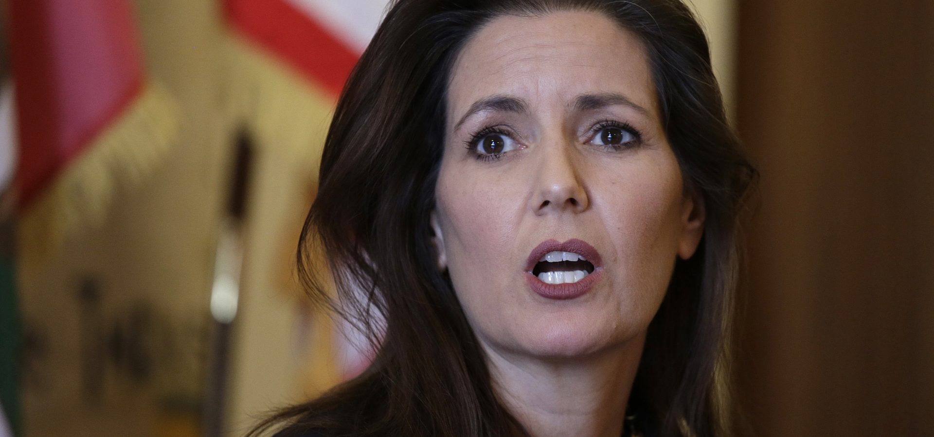 Oakland Mayor Libby Schaaf answering questions during a news conference at City Hall in Oakland, Calif. Another Oakland police chief has stepped down after two days on the job. Acting Police Chief Paul Figueroa is the third chief to be replaced in nine days amid a sex scandal that the city's mayor said involved "disgusting allegations" that a number of officers had sex with a teenage prostitute. Schaaf said Friday, June 17, 2016, her job is to "run a police department, not a frat house." (AP Photo/Eric Risberg, File)