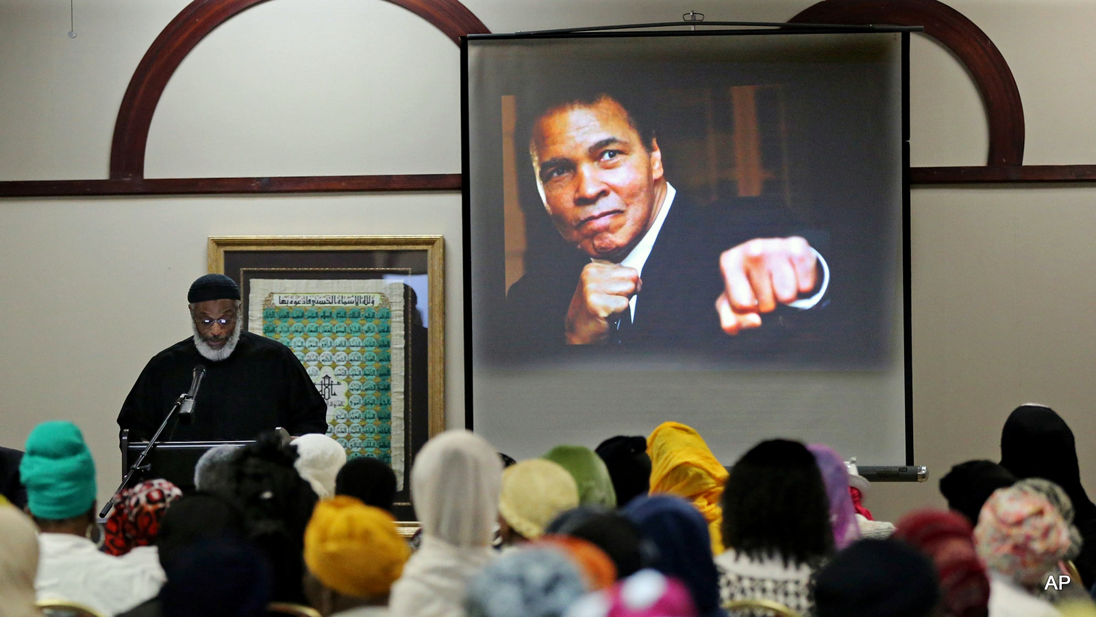 Imam Nadim Ali delivers the closing remarks during an interfaith memorial service for Muhammad Ali at the Atlanta Masjid of Al-Islam on Thursday, June 9, 2016, in Atlanta.  