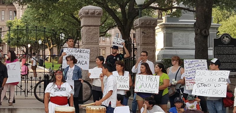 Rally: A June 23, 2016 rally at the Texas State Capitol, organized by the Committee in Solidarity with Teachers in Mexico, honoring activists killed by police in Oaxaca, Mexico while protesting neoliberal education reforms. (Kit O'Connell for MintPress) 