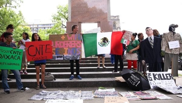 Activists from Canada, U.S., and Mexico gathered in Ottawa to demonstrate against the TPP and Mexican President Peña Nieto. | Photo: Ben Powless / Common Frontiers