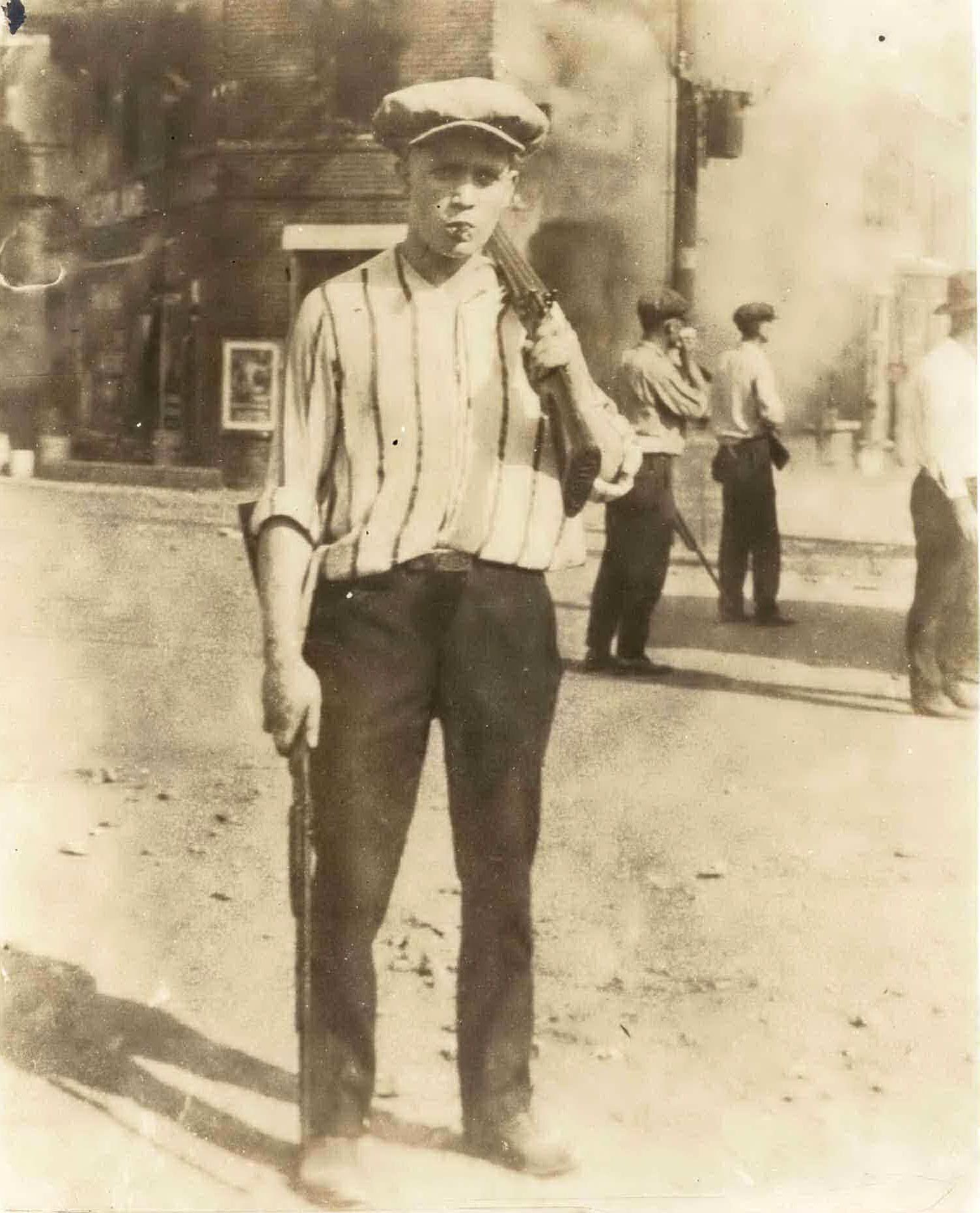 An armed man during the riot.Tulsa Historical Society