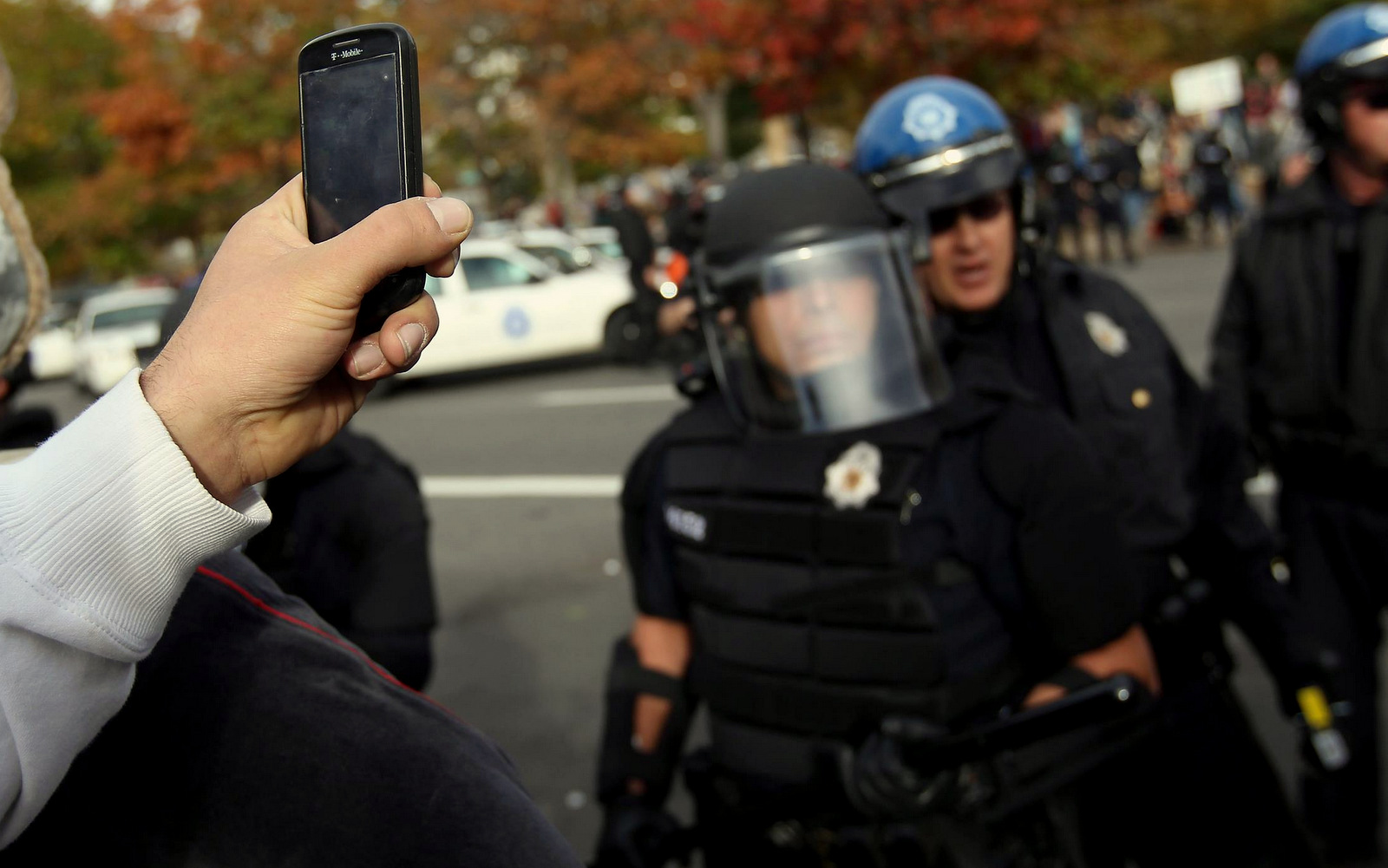 Apple patented a technology to prevent phones from filming at live music events, but privacy advocates say police could use it against activists.