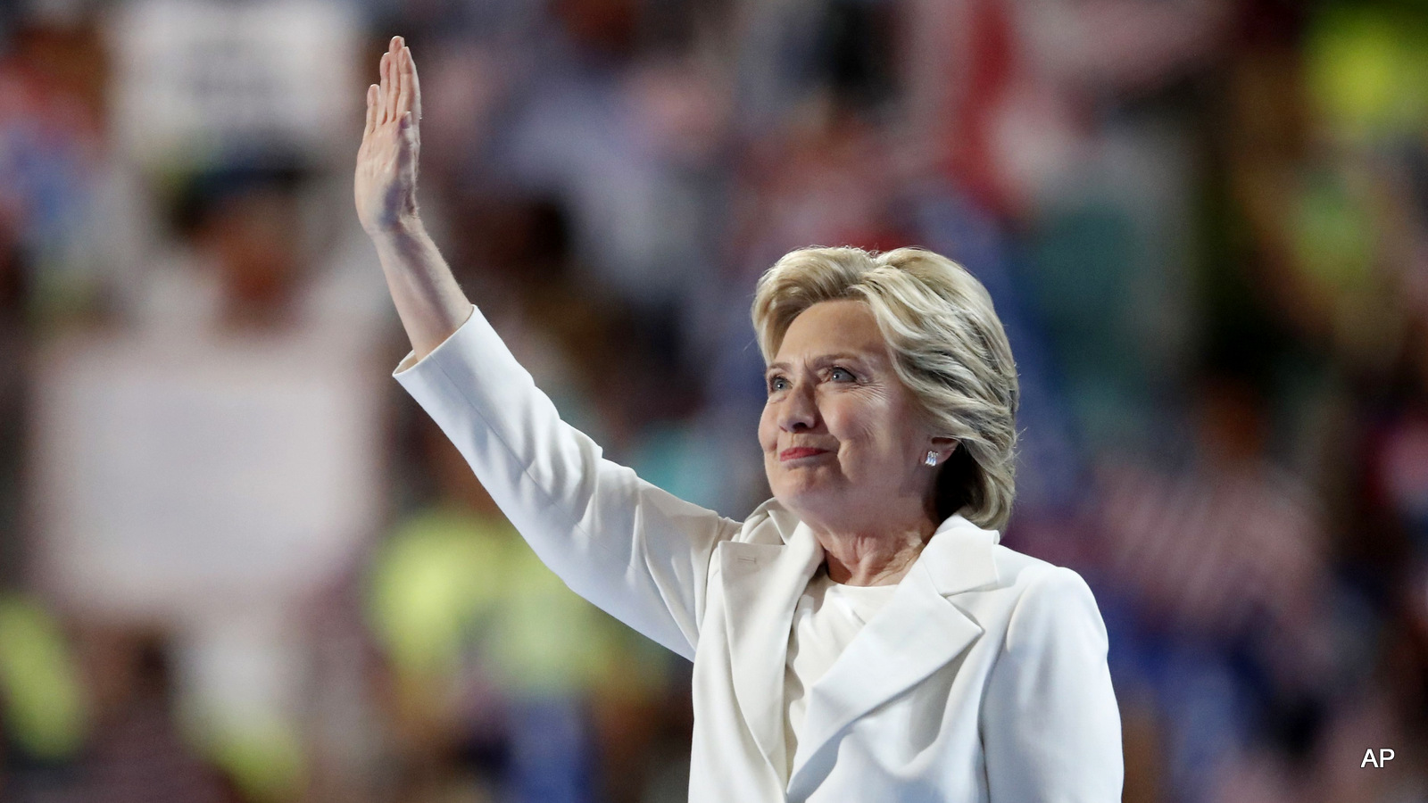 Democratic presidential nominee Hillary Clinton waves after taking the stage during the final day of the Democratic National Convention in Philadelphia , Thursday, July 28, 2016.