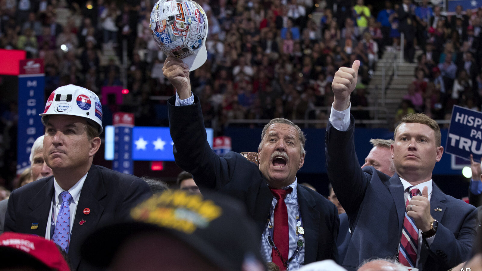 People cheer as Republican presidential candidate Donald Trump speaks during the final night of the Republican National Convention, Thursday, July 21, 2016, in Cleveland.