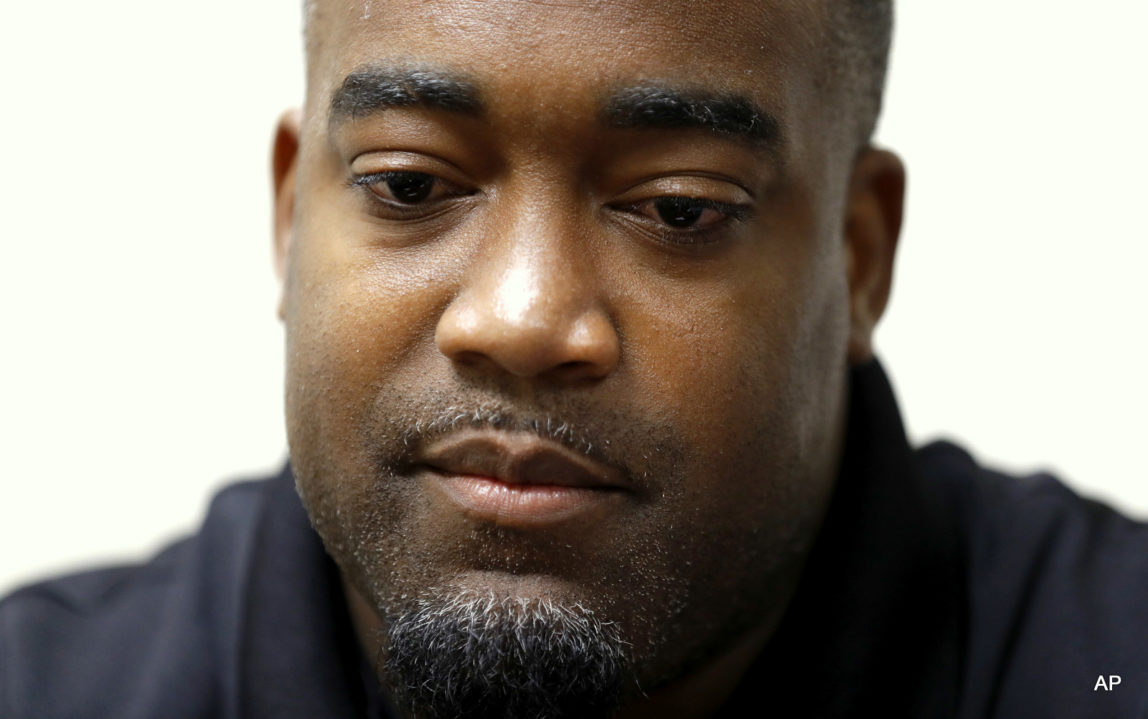 Mark Hughes takes part in an interview at his attorney's office, Saturday, July 9, 2016, in Dallas. Hughes was mistaken early as a suspect by the Dallas Police Department after five police officers were killed in downtown Dallas Thursday night.